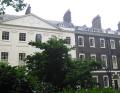 Bedford Square Garden showing gate overthrow and central house of terrace, June 2008. Photo: S Williams
