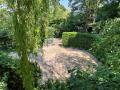 OmVed Gardens, Willow Circle, June 2023. Photograph Sally Williams