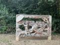 Pinner Memorial Park, carved panel at entrance, September 2024. Photograph Sally Williams