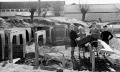 Photo reproduced by permission of London Borough of Merton
Late 1940's. Nelson Gardens, Merton: Children playing in former air raid shelters Photo reproduced by permission of London Borough of Merton
Late 1940's. Nelson Gardens, Merton: Children playing in former air raid shelters